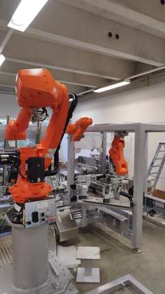 KUKA industrial robots during installation